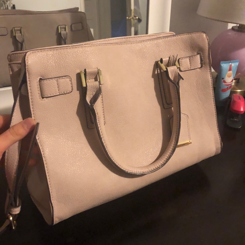 Blush pink purse, lots of compartments